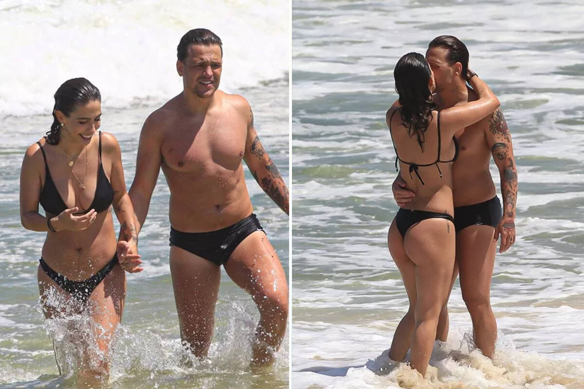 Gabi Brandt e Saulo Poncio curtem dia de praia e trocam beijos no Rio