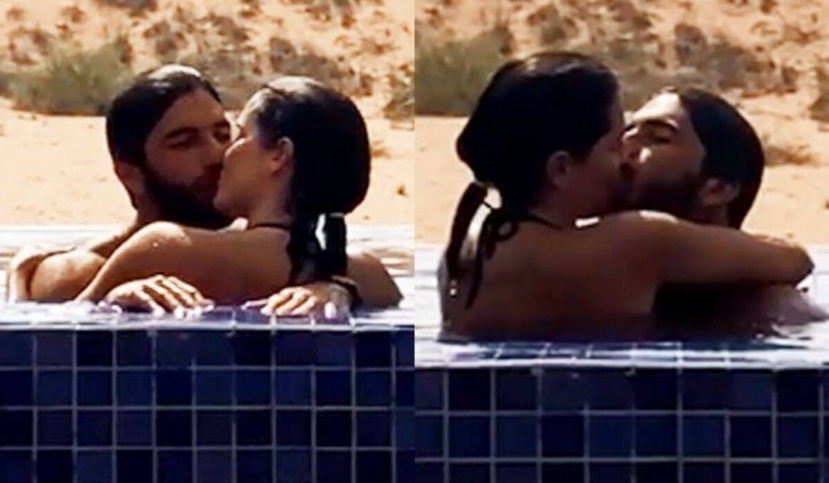 Deborah Secco troca beijos quentes com o marido em piscina