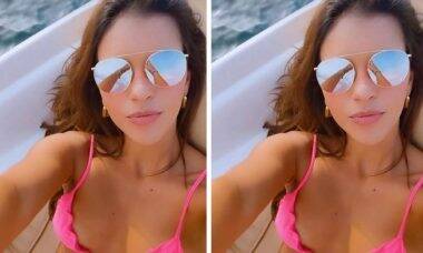 Mariana Rios posa em passeio de barco usando biquíni pink e óculos